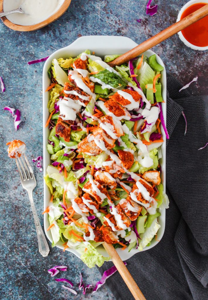 Buffalo chicken salad in a large rectangle serving dish.