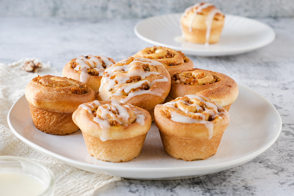 A plate of carrot cake cruffins.