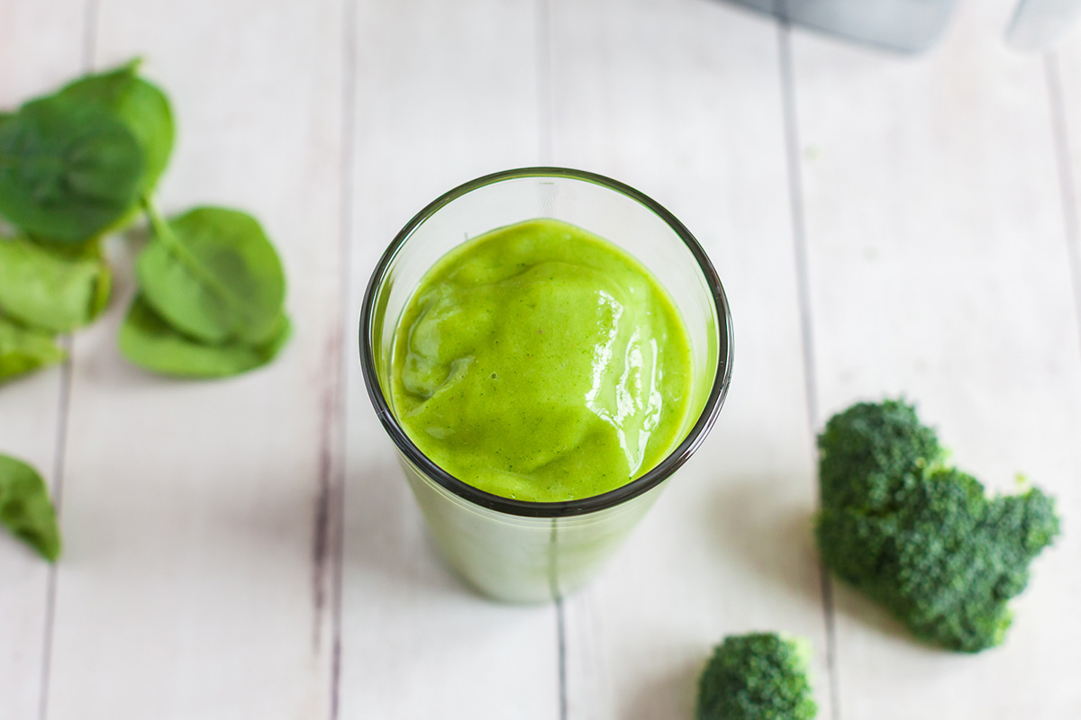 Broccoli smoothie on the counter.