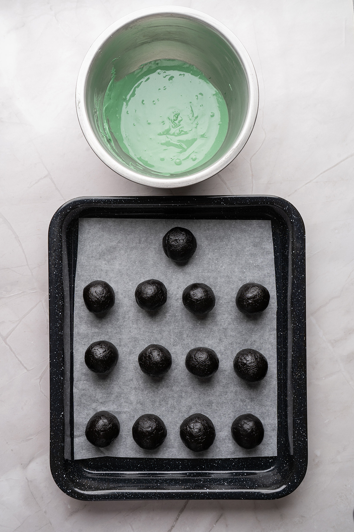 Turn classic Oreo truffles into the cutest holiday treat with these Grinch Oreo balls. They’re rich, no bake, and perfect for cookie trays, parties, and gifting. Rolled Oreo truffle balls arranged on a parchment-lined tray next to a bowl of melted green candy coating.