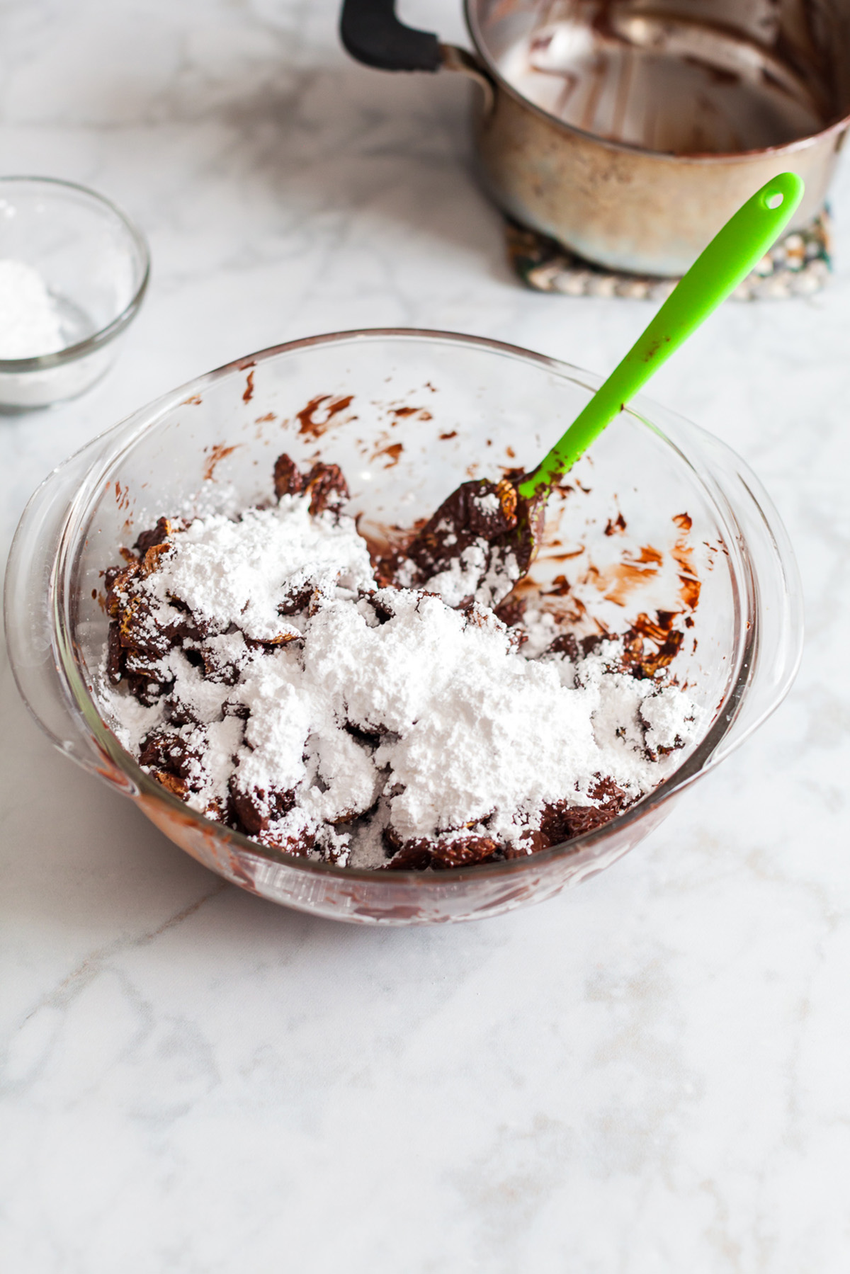 Chocolate and peanut butter mixture tossed with Crispix cereal and powdered sugar for puppy chow,
