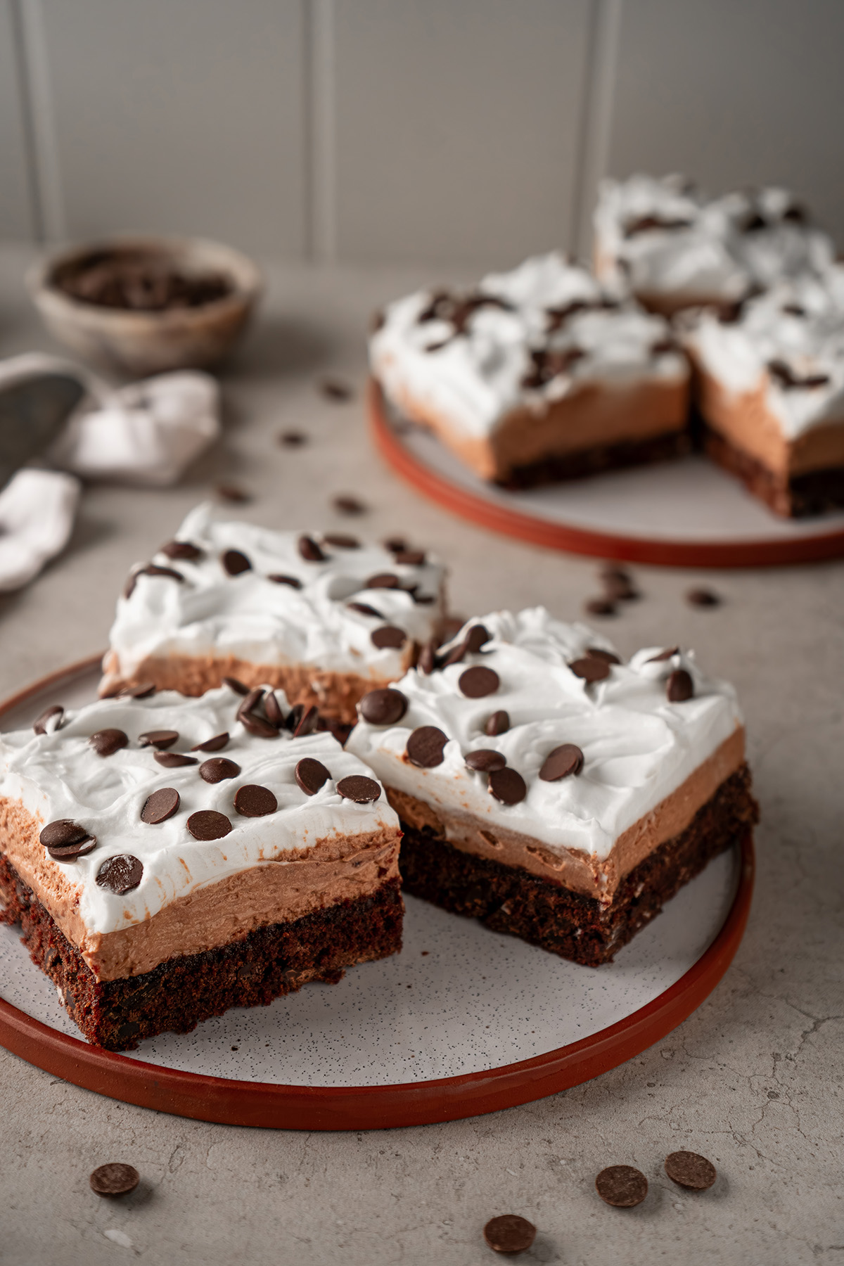 French silk brownies made with brownie mix arranged on a plate showing rich brownie layers and creamy chocolate silk topping.