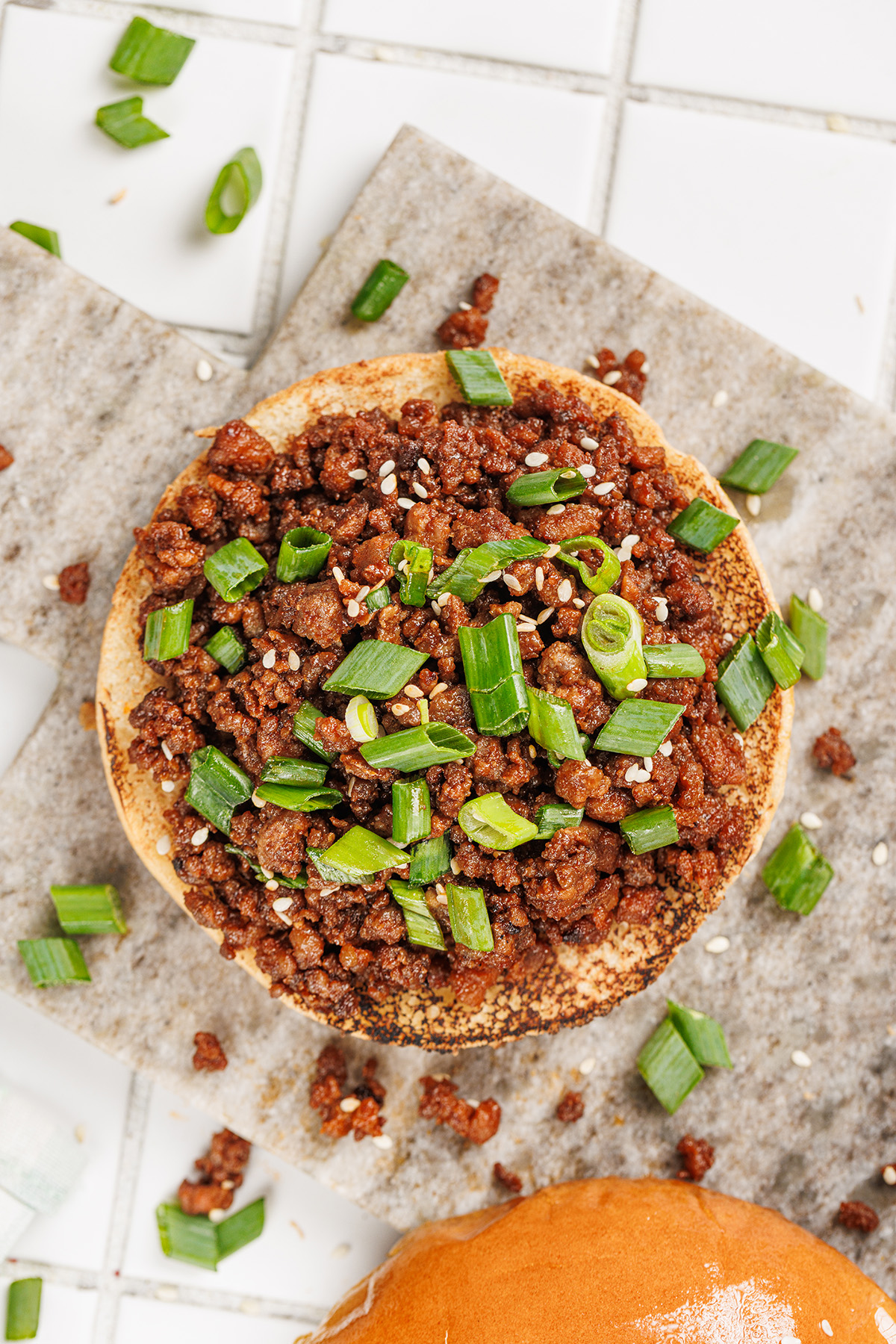 Korean sloppy joe sandwiches filled with sweet and savory ground beef and finished with green onions.