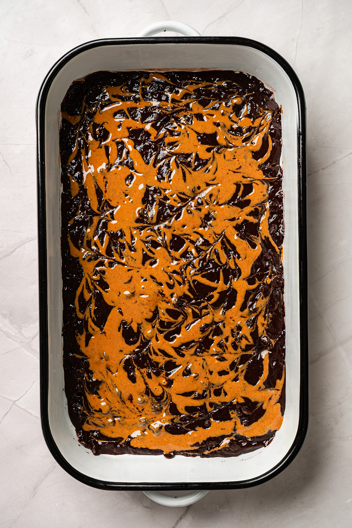 Peanut butter mixture dropped and swirled into brownie batter before baking chocolate peanut butter swirl brownies.