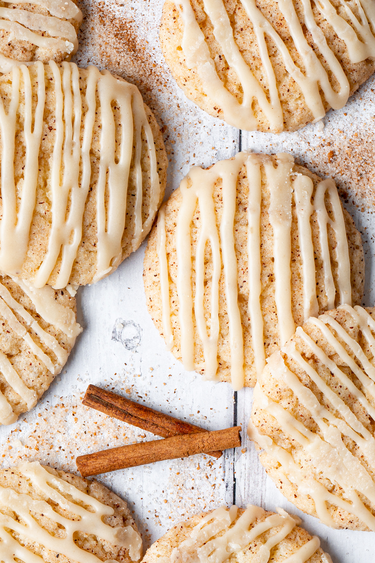 Soft cake mix churro cookies topped with caramel glaze and cinnamon sugar.
