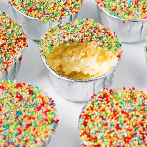 Viral dot cakes with rainbow sprinkles and creamy frosting filling.